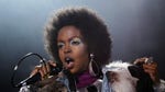 Lauryn Hill's attorney says the Grammy-winning singer has paid her overdue taxes ahead of her scheduled sentencing for tax evasion.